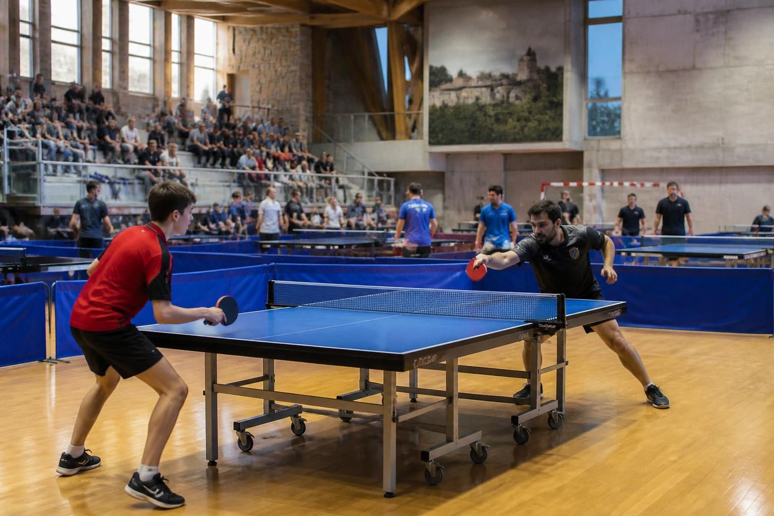disfruta del emocionante torneo de tenis de mesa en bourganeuf, donde jugadores de diferentes ciudades compiten con gran energía y destreza en una vibrante competencia.